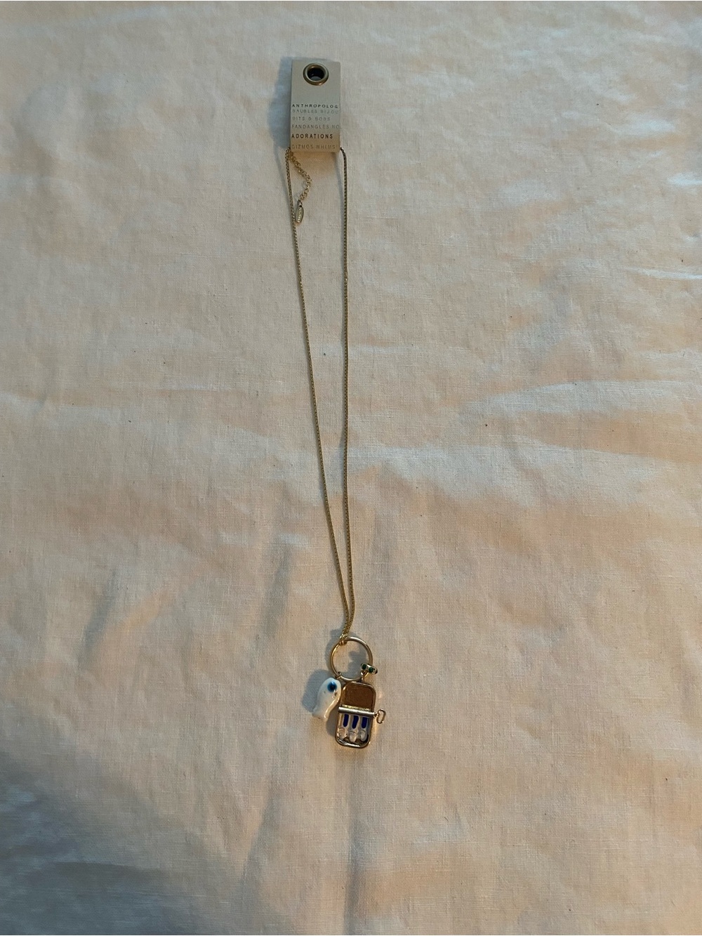 Anthropologie canned sardine charm necklace